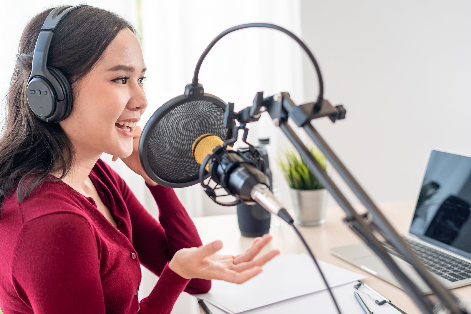Woman explaining how to start a podcast for your business