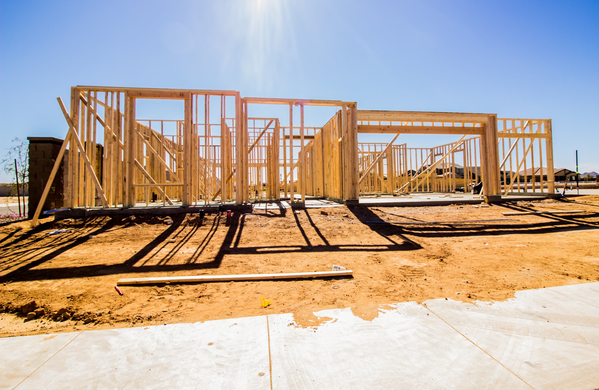 vecteezy_new-home-construction-in-framing-stage_14324856